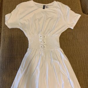 Mini dress with fitted waist